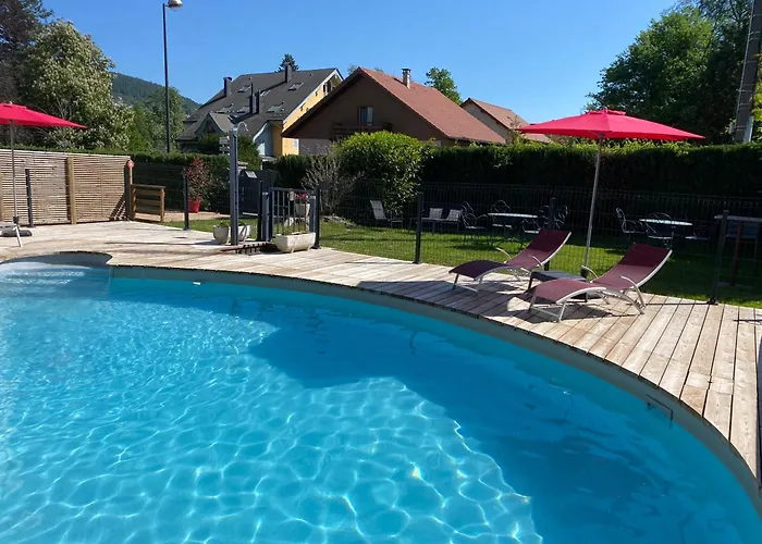 Les 4 Flocons, Avec Piscine Exterieure Chauffee A 100M Du Lac Et Du Centre , Wifi, Parking, Sauna